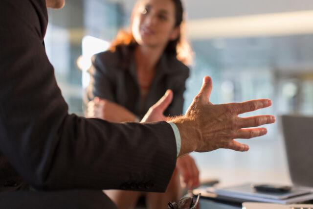 Businessman gesturing in meeting